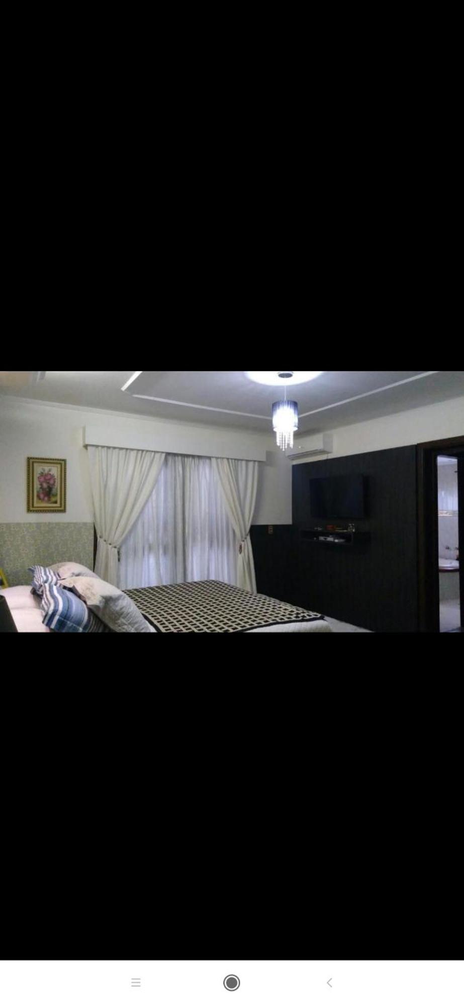 Residencial Pine House Pensión Canela